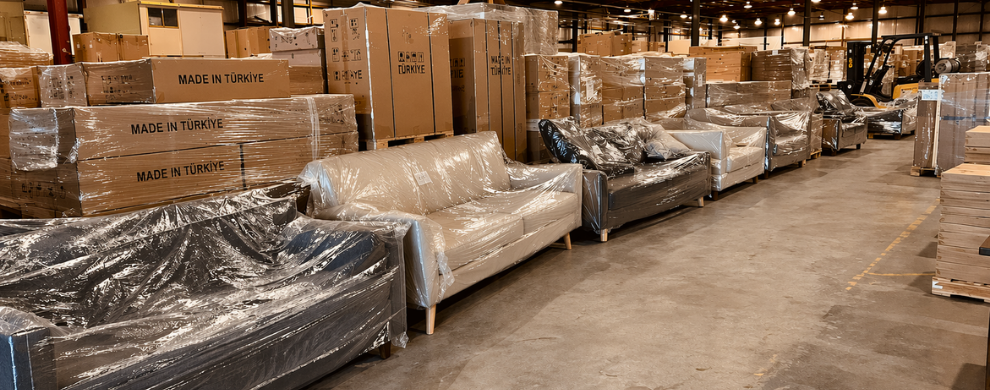 Furniture storage and logistics warehouse with packaged home and office furniture